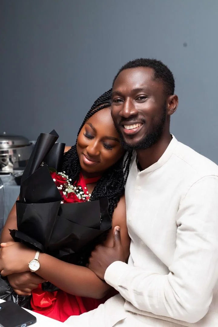 Emmanuel and Nana Afua sharing a loving moment